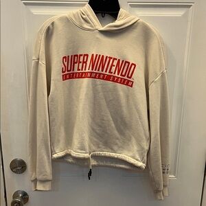 Super Nintendo Beige Hoodie Logo and Controller Buttons on Sleeve